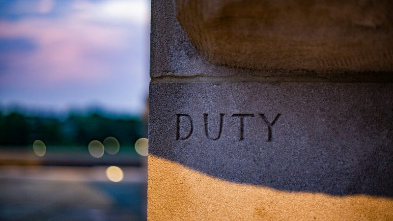 Close up photo of "Duty" engraved on the Pylons, Blacksburg Campus